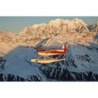 Pogled na Cessnu floatplane u Alasci Range preko Ruth Glaciera na zalasku sunca Južna Aljaska Poster