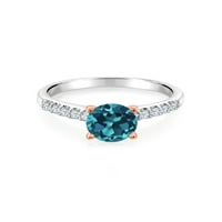Gem Stone King 2. CT London Blue Topaz White Created Sapphire Srebrni prsten sa 10k ružičastom zlatnim zupcima